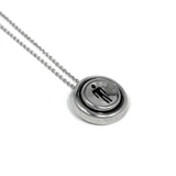 left side view of the Player 1 necklace on a white background