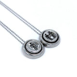 left side view of the Player 1 player 2 necklaces on a white background