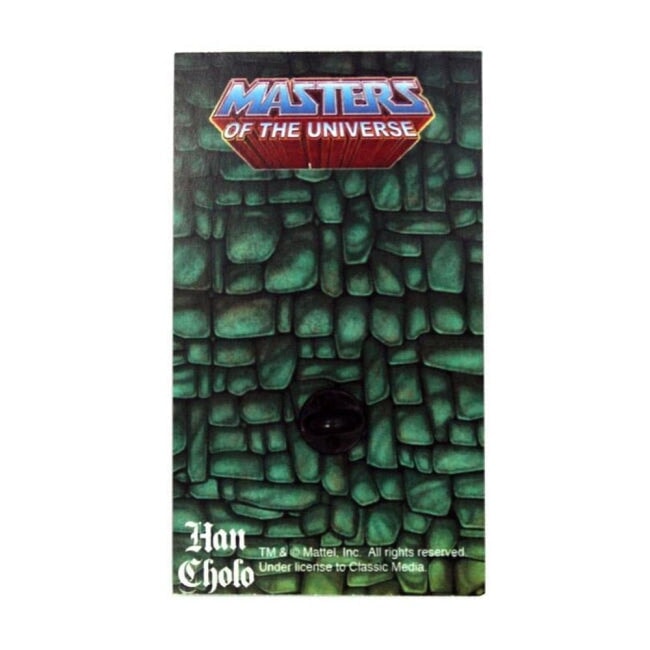 back of the power sword pin on a masters of the universe pin card