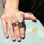 shot of a man wearing the raider ring and the skeletor armor ring