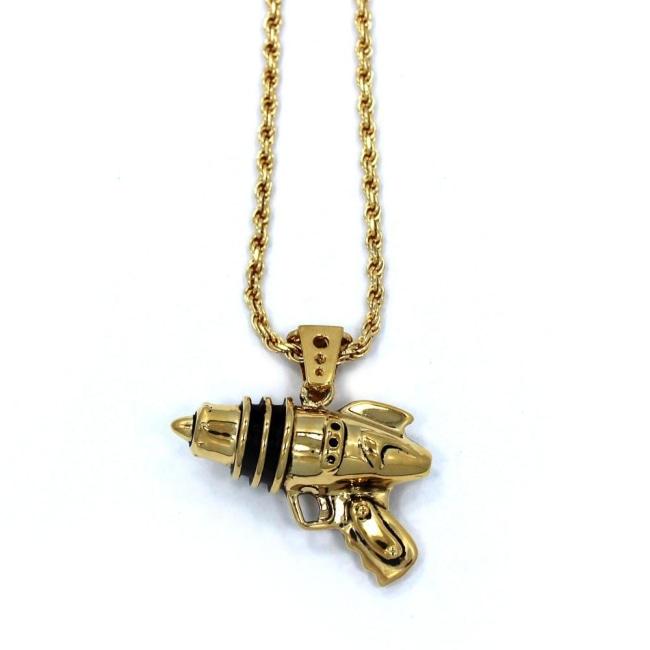 right side shot of the Ray Gun Pendant in gold on a white surface