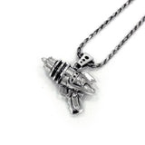 right angled shot of the Ray Gun Pendant in silver on a white surface