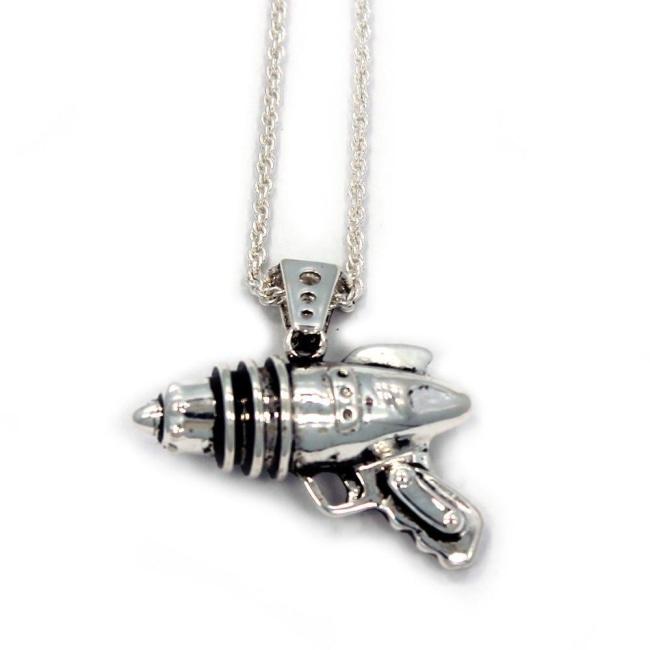 right side shot of the Ray Gun Pendant in silver on a white surface