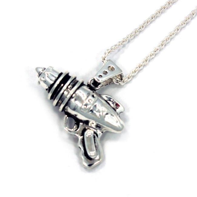 left angled shot of the Ray Gun Pendant in silver on a white surface
