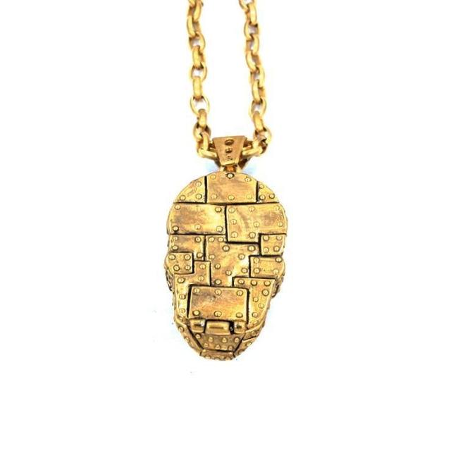 back of the Rivet Skull Pendant in gold from han cholo skulls collection