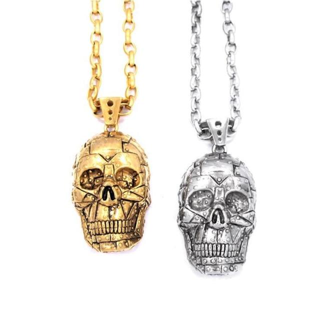 shot of the Rivet Skull Pendant in gold and silver from han cholo skulls collection