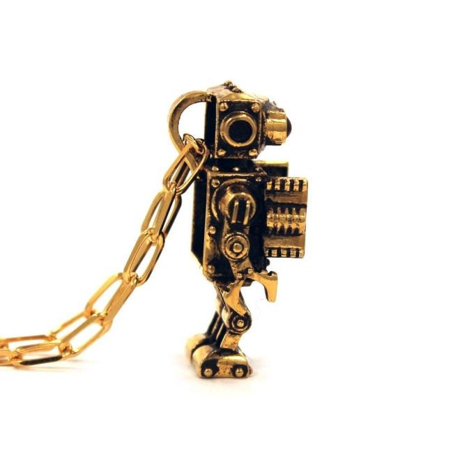 left side profile view of the Robot Pendant in gold on a white background