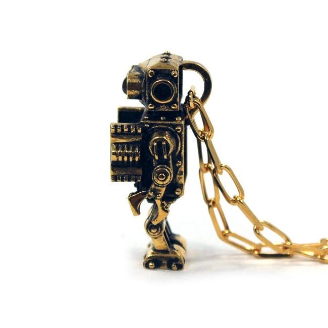 right side profile view of the Robot Pendant in gold on a white background