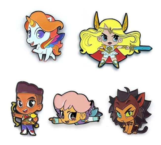 shot of all 5 she-ra chibi enamel pins casting a shadow on a white background