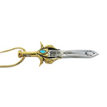 She-Ra Sword Pendant angled pointing to the left on a white background showing other side
