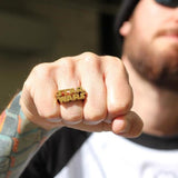 shot of a man wearing the Star Wars Logo Ring in gold from the star wars collection