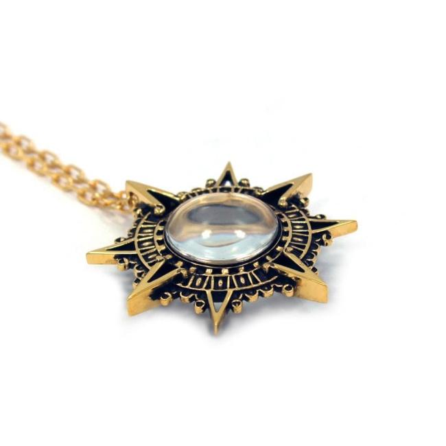 left side of the Stargate Pendant in gold from the han cholo jewelry collection