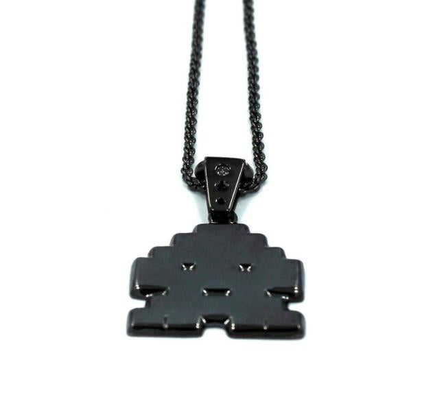 up close view of the Stoney invader pendant in gunmetal on a white background