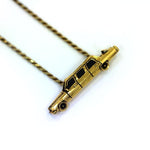 right angle of The High Life Pendant in gold form the han cholo cruising collection