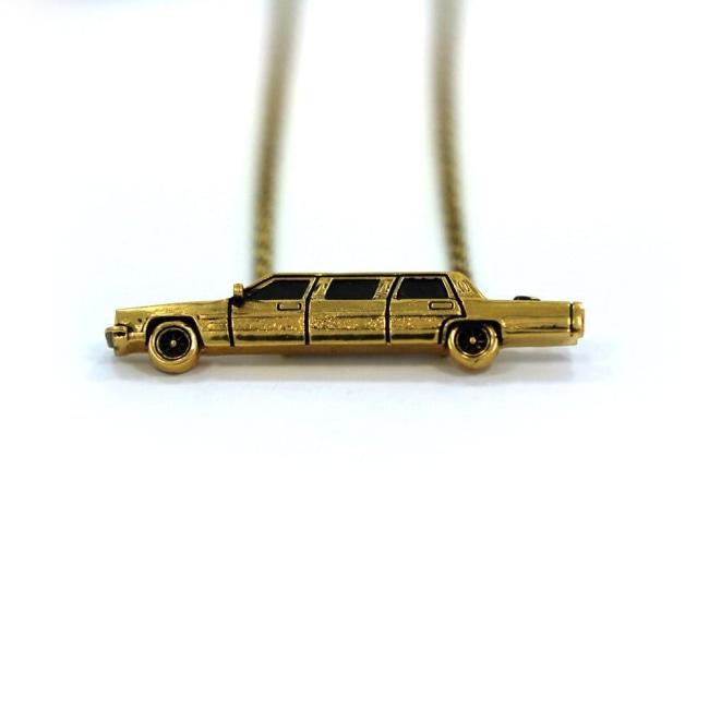 up close detail of The High Life Pendant in gold form the han cholo cruising collection
