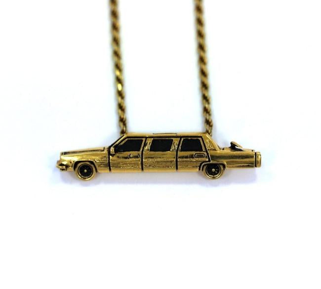 front of The High Life Pendant in gold form the han cholo cruising collection
