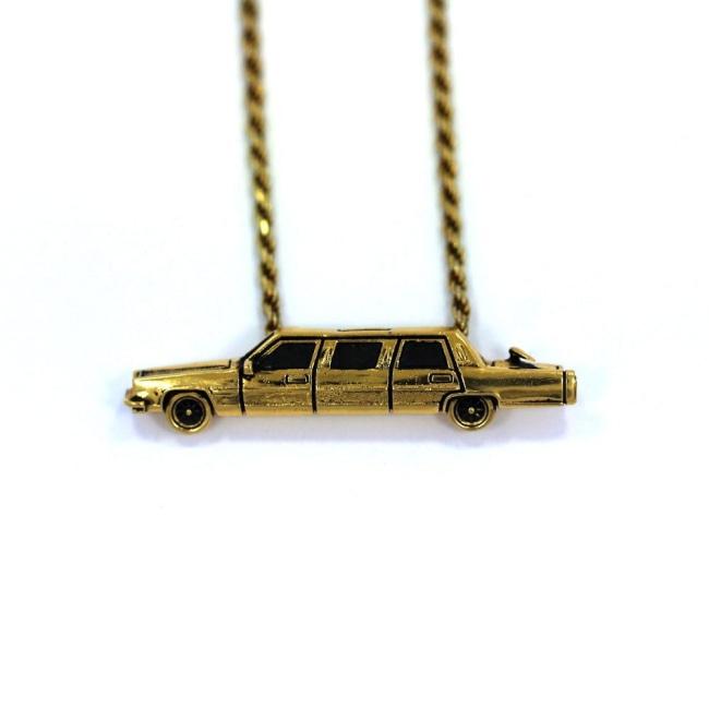 front of The High Life Pendant in gold form the han cholo cruising collection