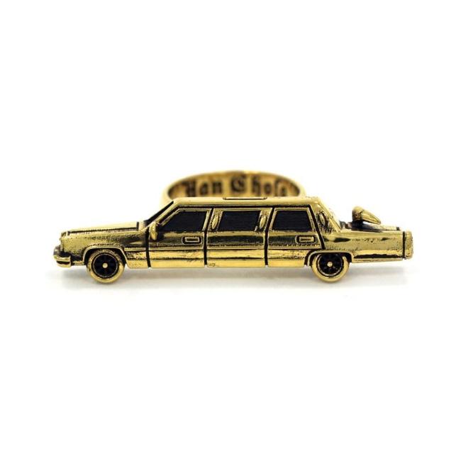 front of The High Life Ring in gold form the han cholo cruising collection