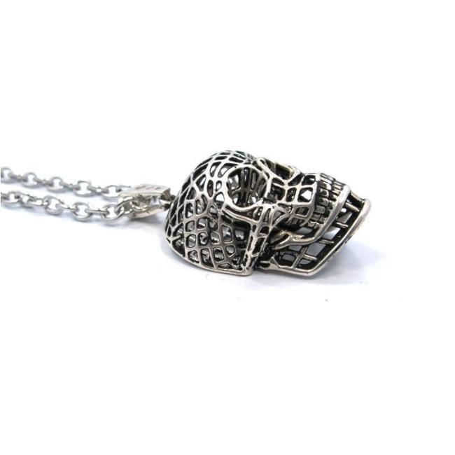 side of the Mesh Skull Pendant in silver from the han cholo skulls collection