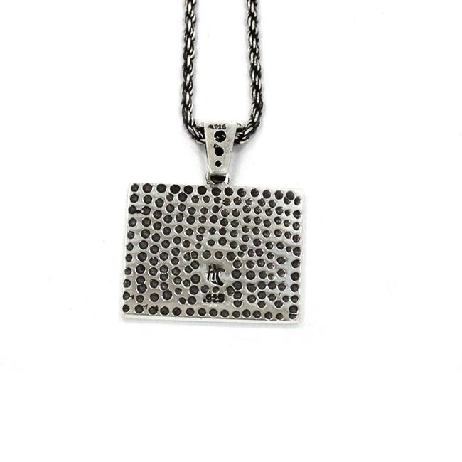 back of the Turntable Pendant in silver from the han cholo music collection