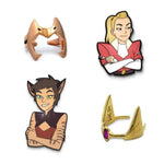 catra and adora enamel pins and she-ra rings from she-ra and the princesses of power
