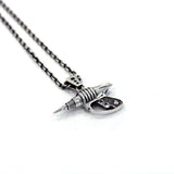 left side shot of the Zap pendant in silver on a white surface