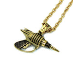 up close left side shot of the Zap pendant in gold on a white surface