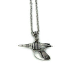 front view of the Zap pendant in silver on a white surface