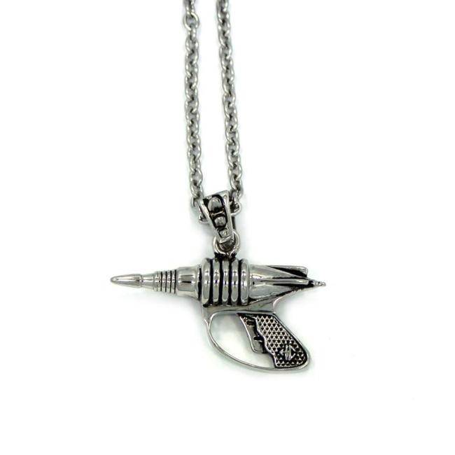 front view of the Zap pendant in silver on a white surface