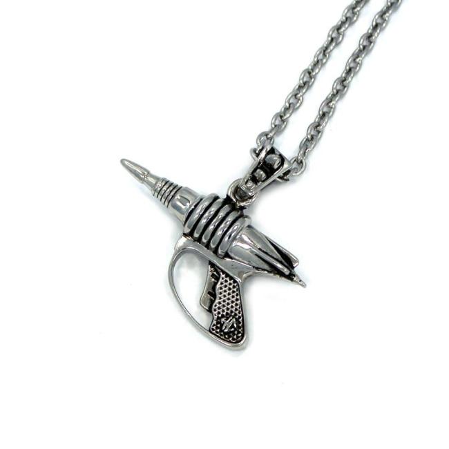 left side view of the Zap pendant in silver on a white surface