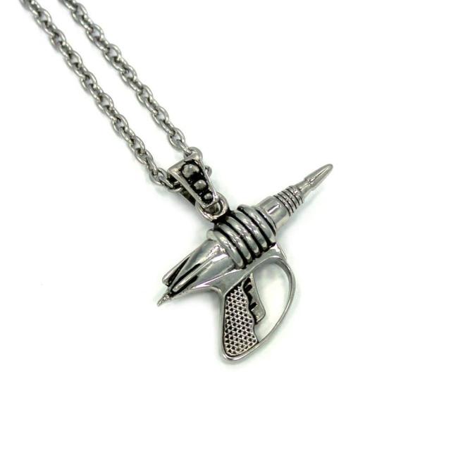 right side view of the Zap pendant in silver on a white surface